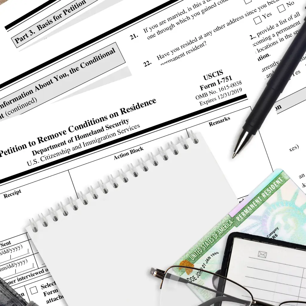 The image depicts official paperwork and desk items that represent how LLC renewal paperwork can get covered up or overlooked, masking critical compliance issues that still need to be addressed before deadlines are missed.