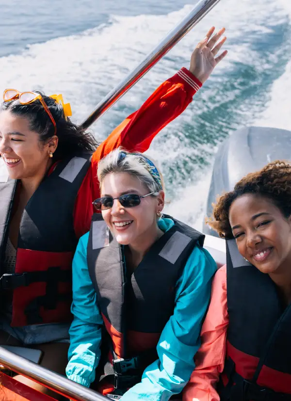 passengers on speedboat representing Montana vehicle registration for recreational watercraft